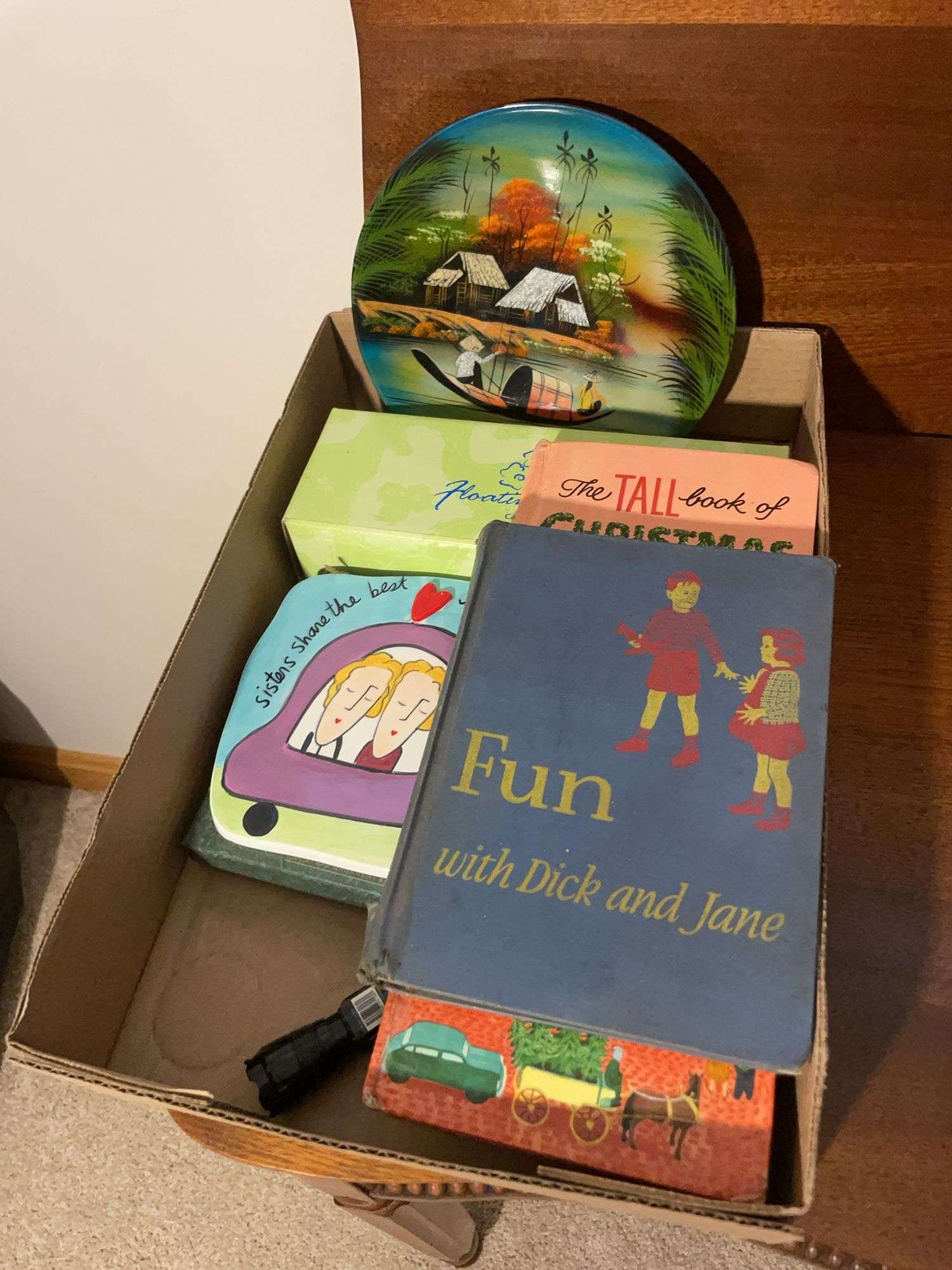 Decorative plates and vintage books