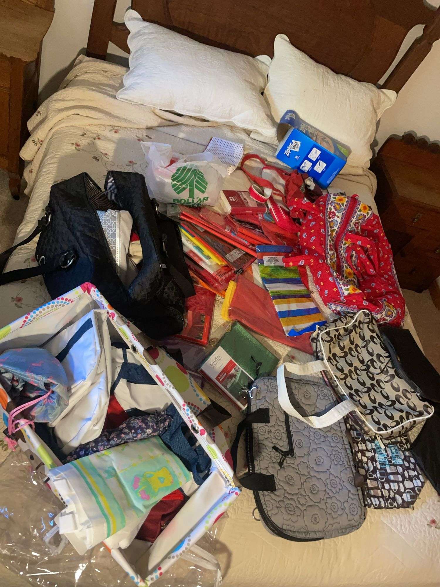 Large assortment of purses, tablecloths, and storage bags