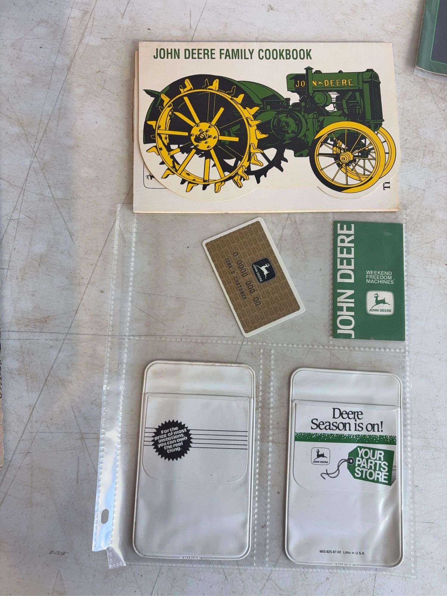 John Deere pocket books, promotion calendars, and other advertising booklets