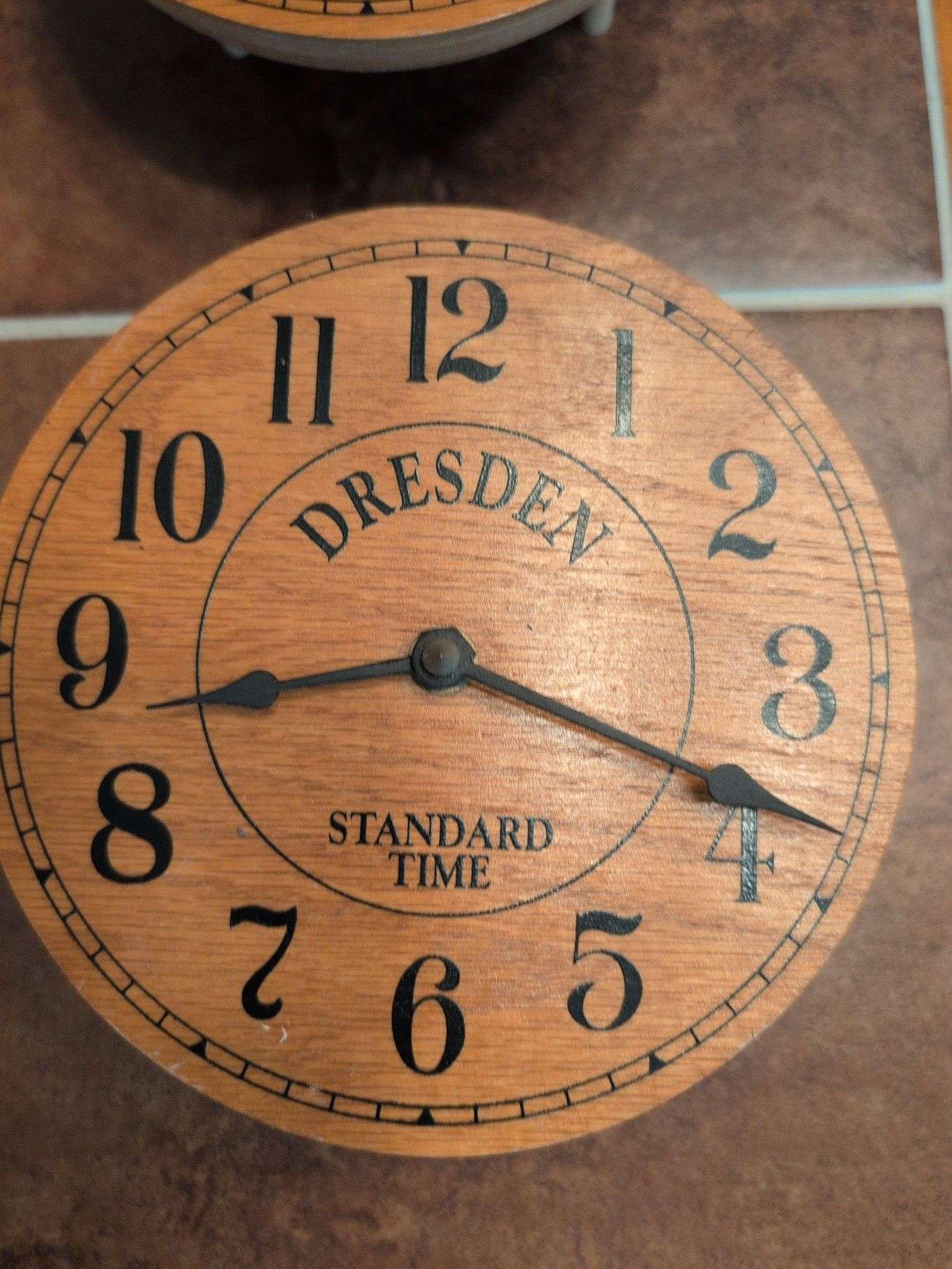 Advertisement yard sticks and (2) Dresden clocks