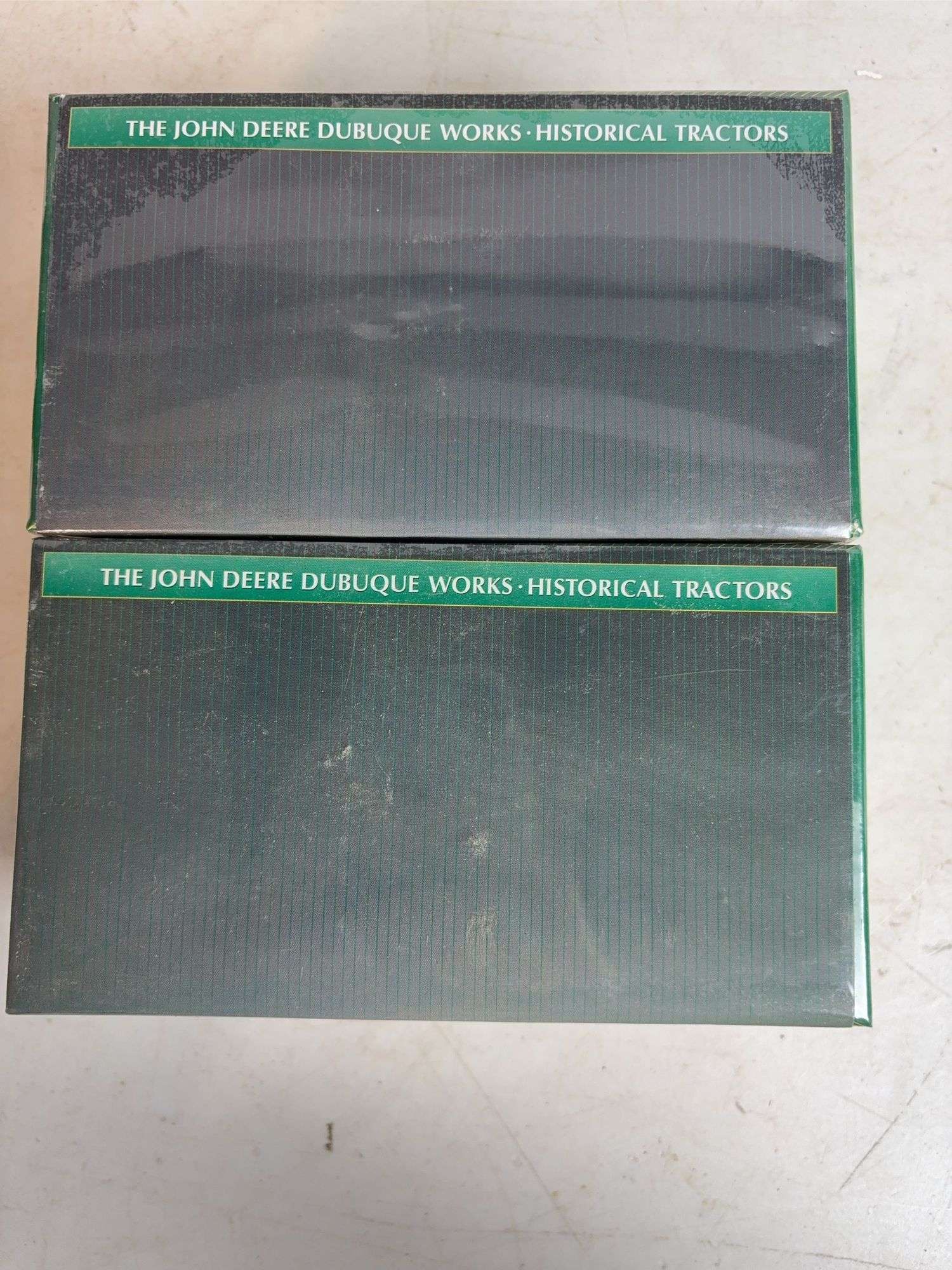 (2) John Deere historical tractor toy sets - 1/64 scale, factory sealed
