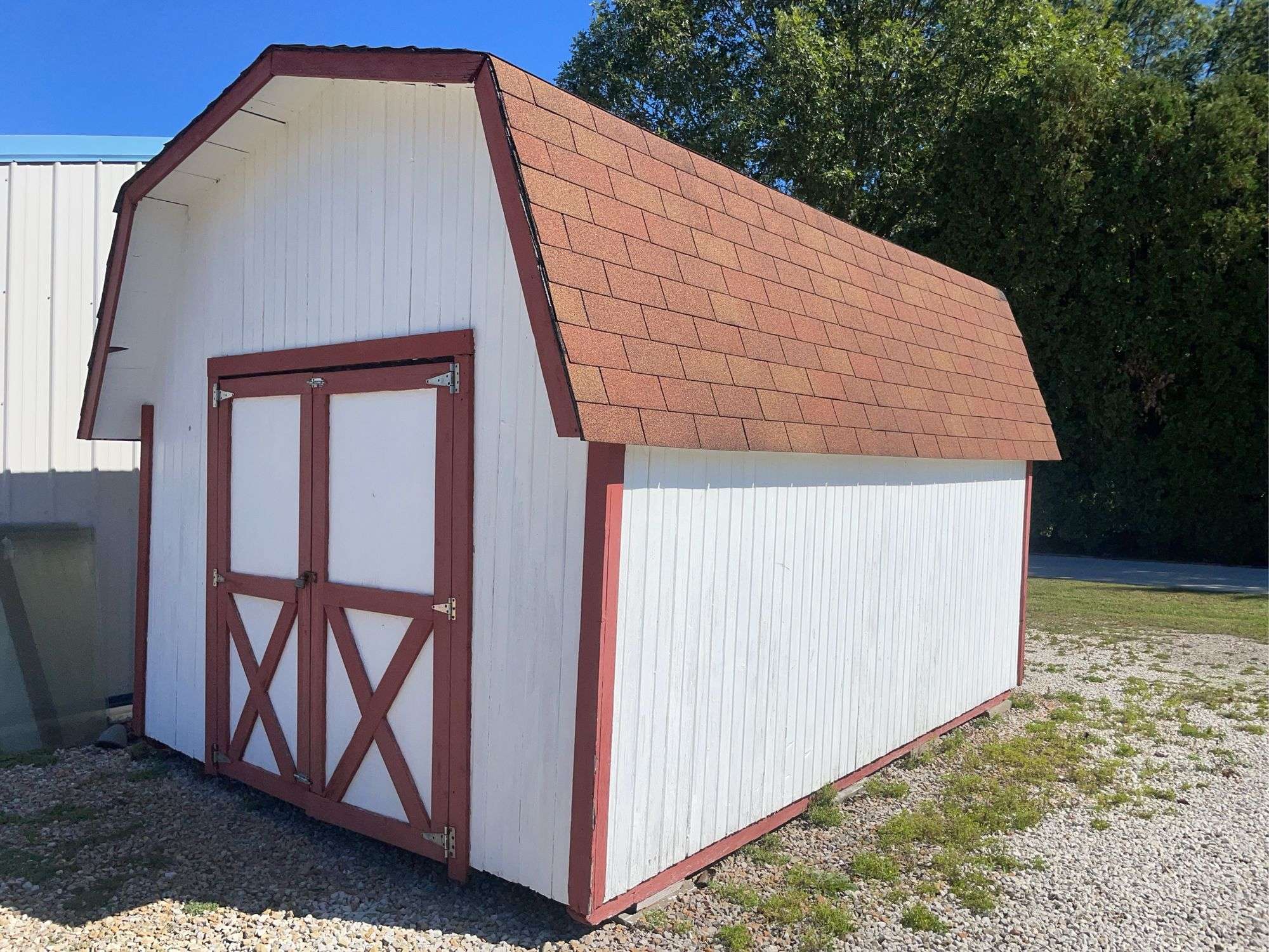 10x14 White and red storage barn - contents not included