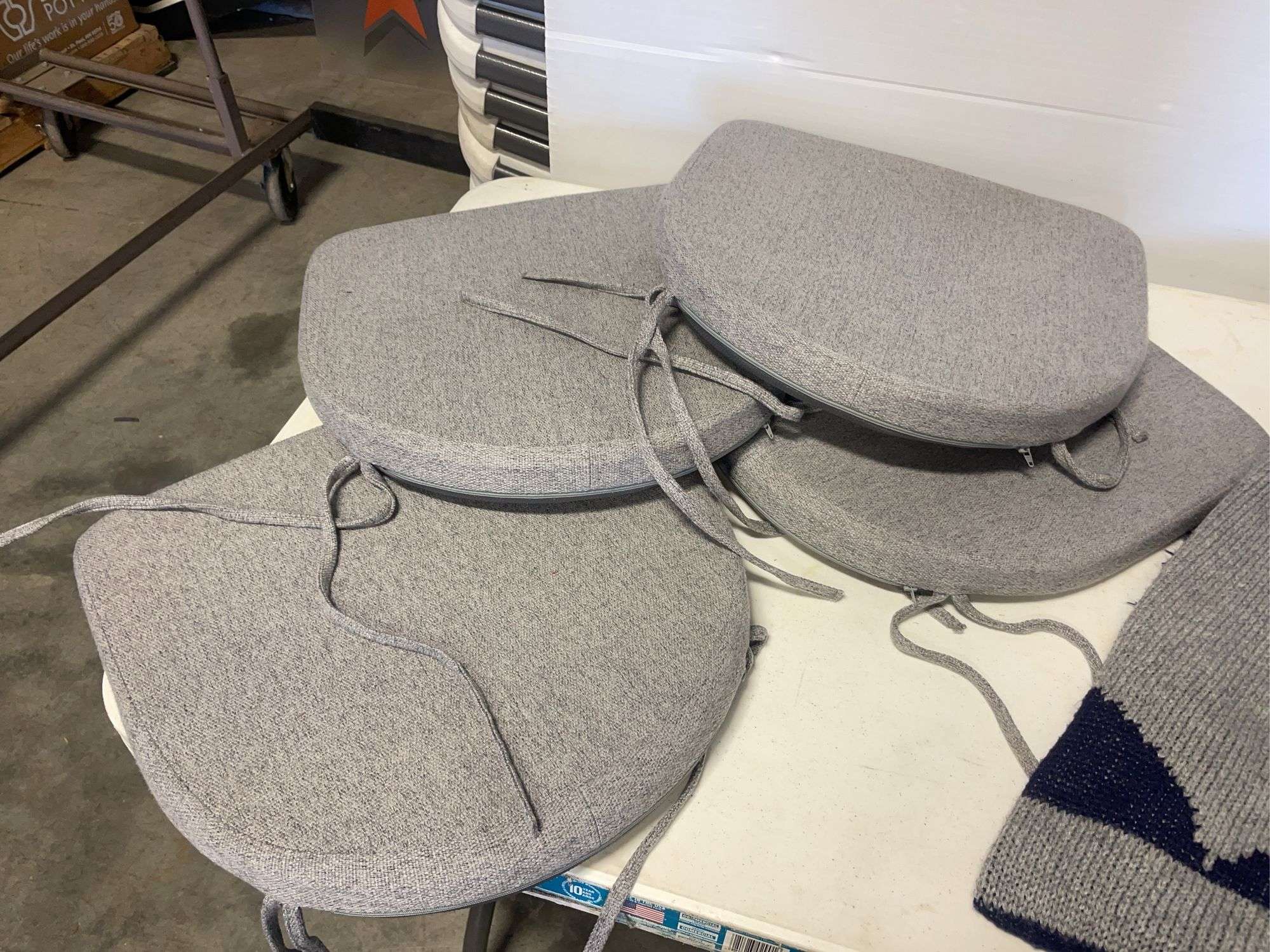 Blankets, seat cushions, Easton trash bin, and basket