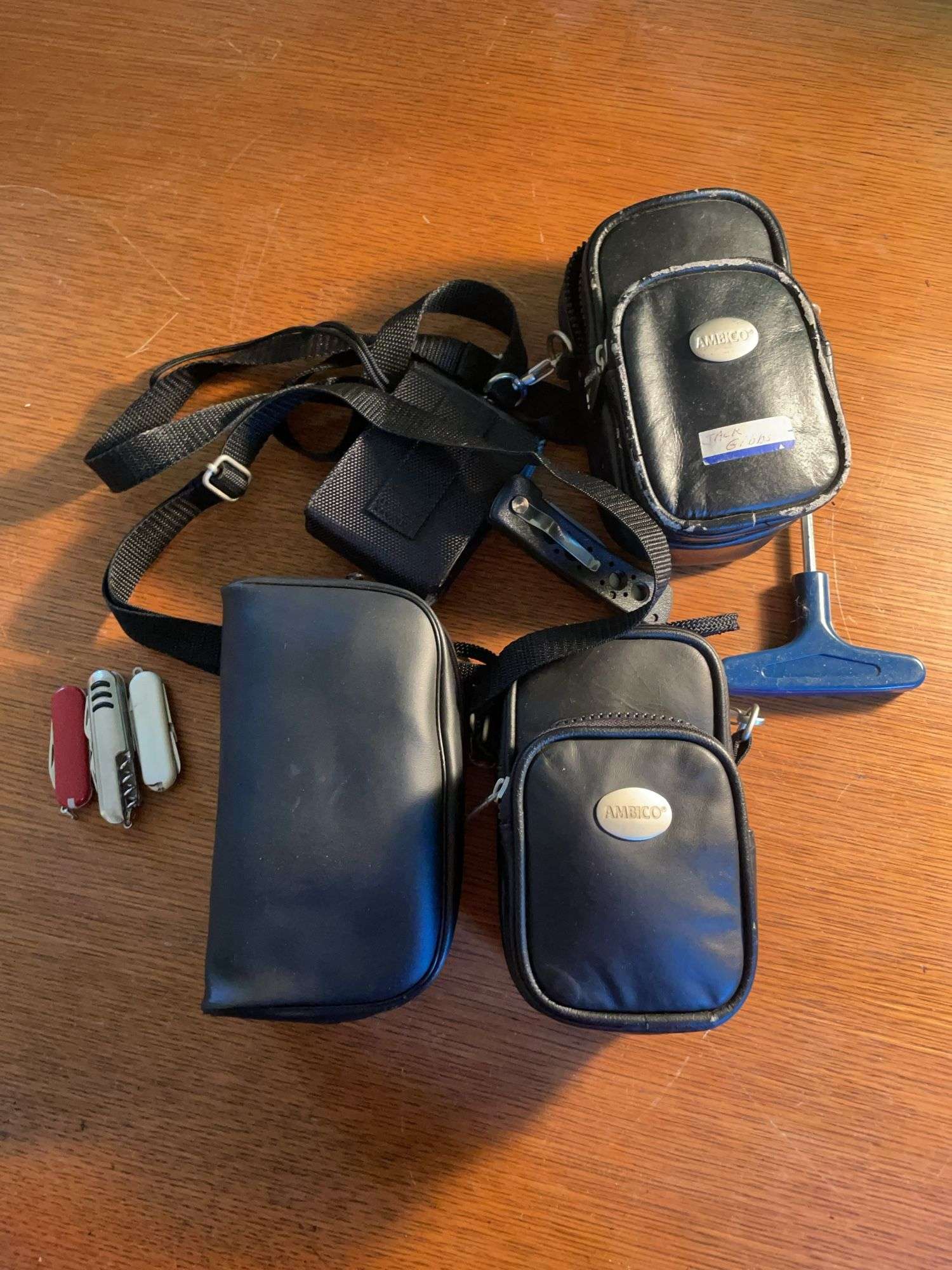 (2) Ambico cameras, blood pressure cuff, and (4) pocket knives