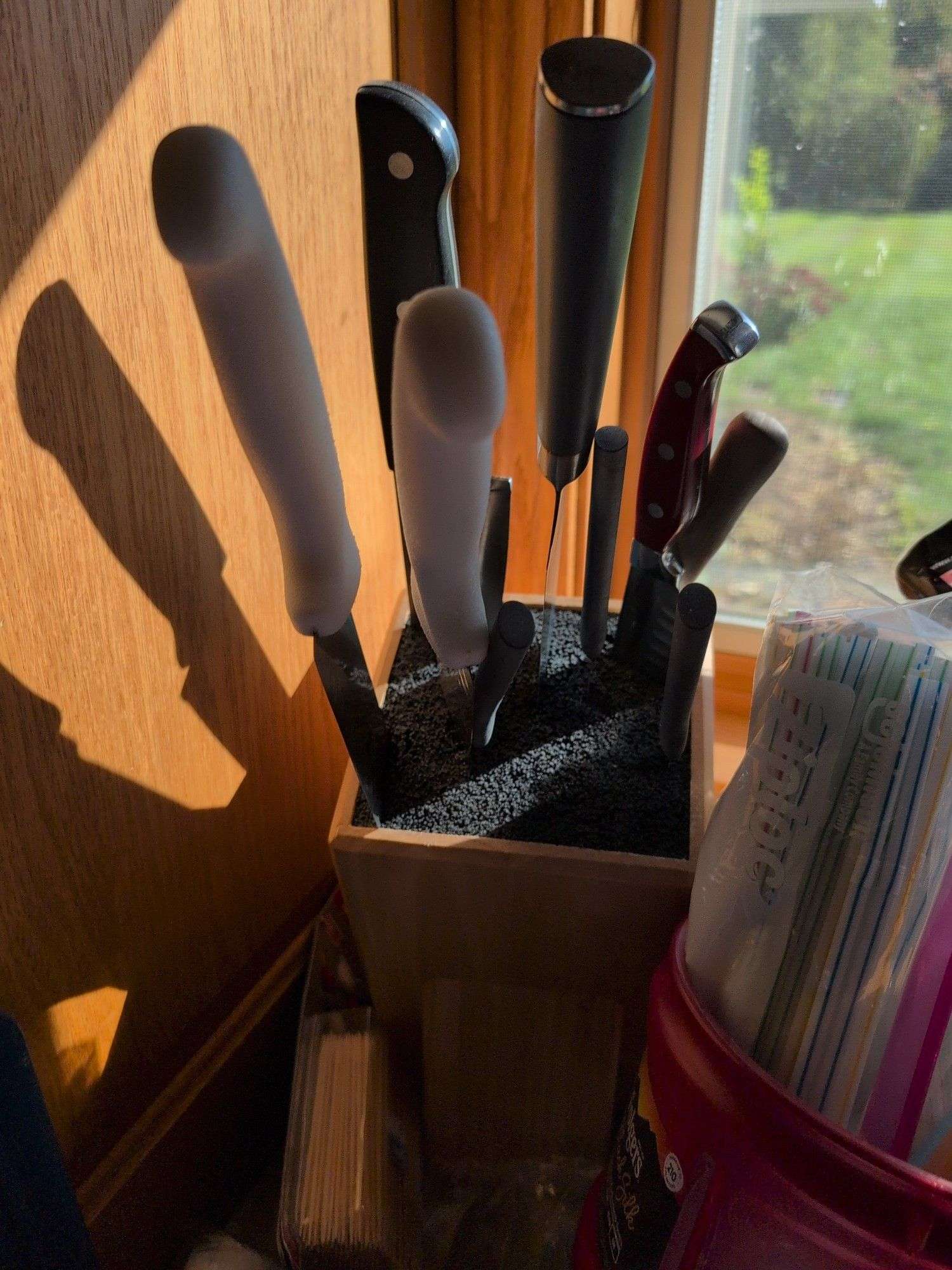 Knives with knife block, jars, flashlight, and other household items