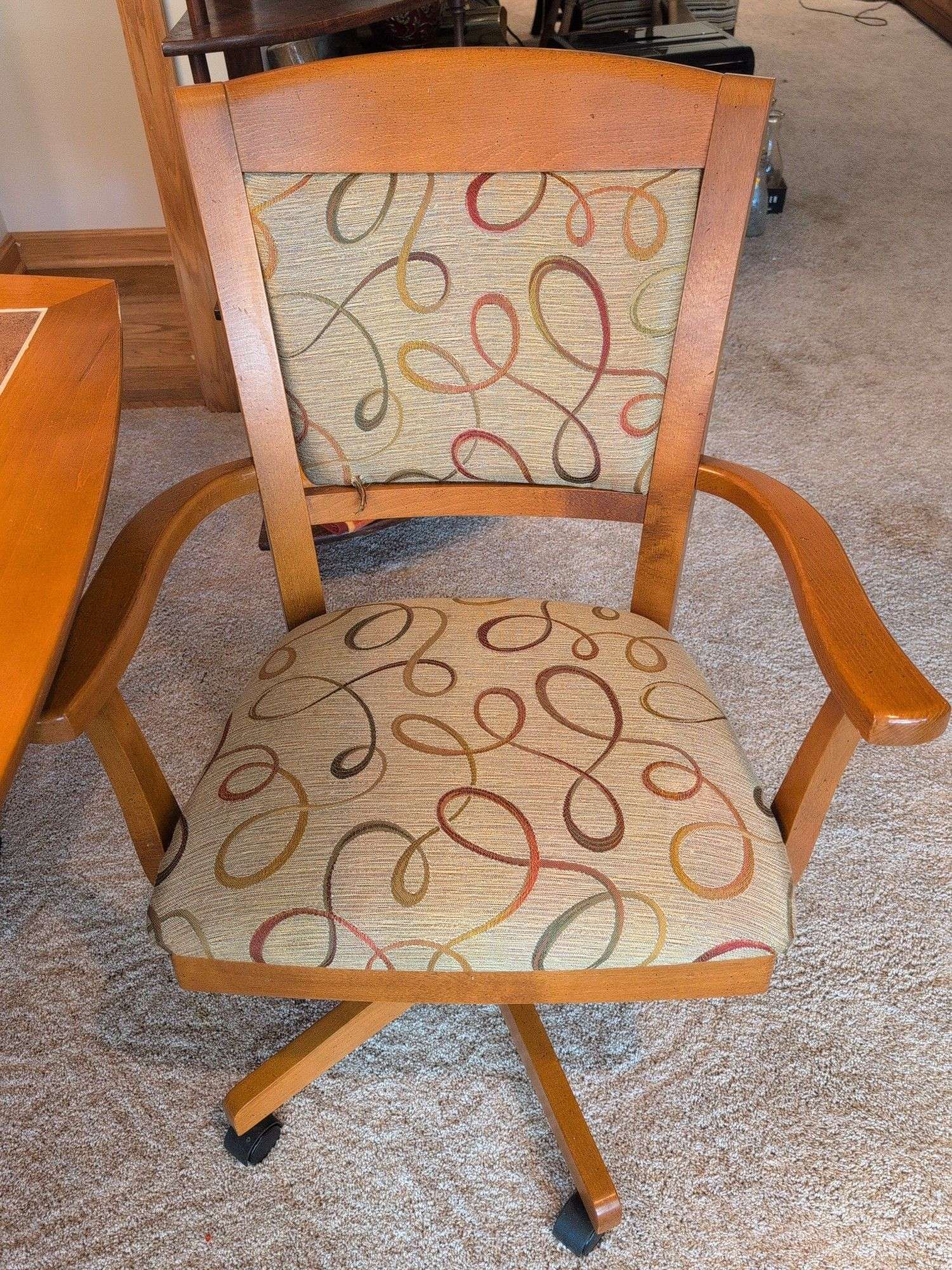 Matching dining table and (6) swivel chairs