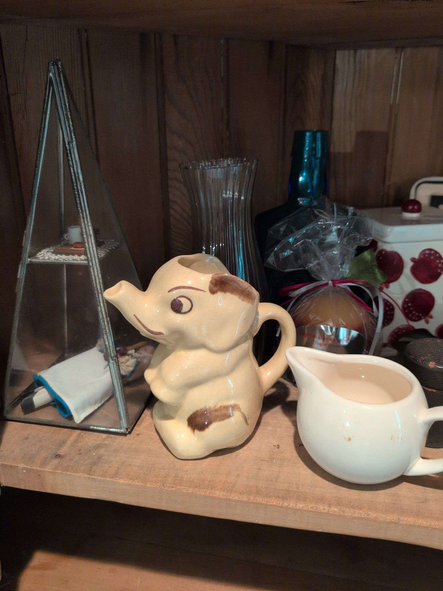 Shelf of decorative glassware pieces