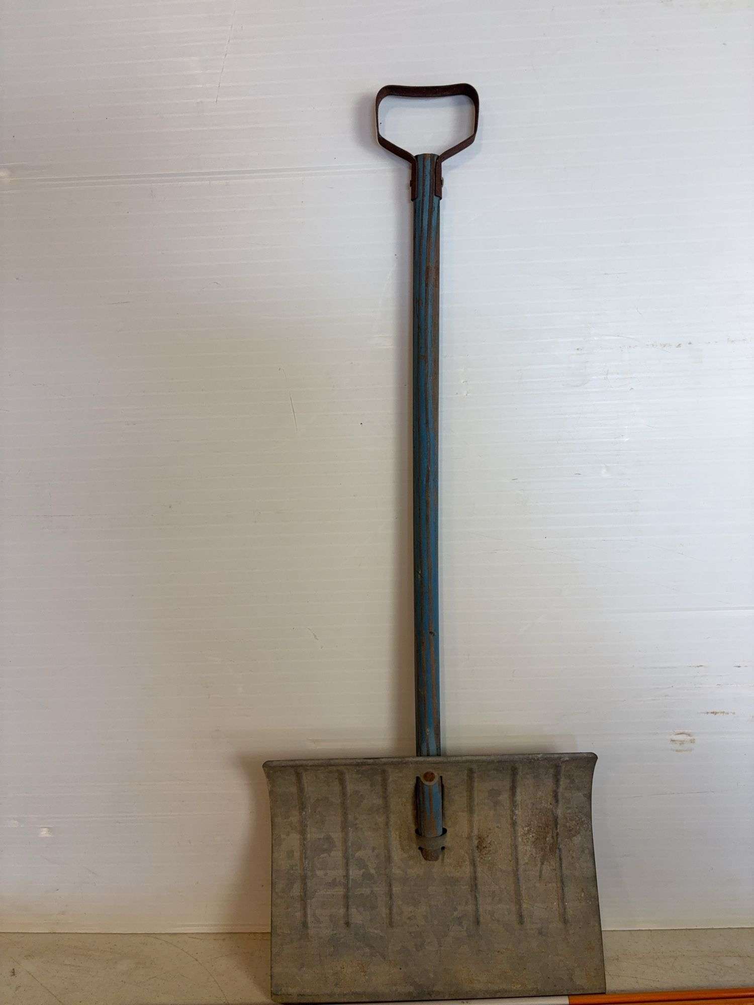 Yard markers, decorative shovel, branch trimmer, and antique piece