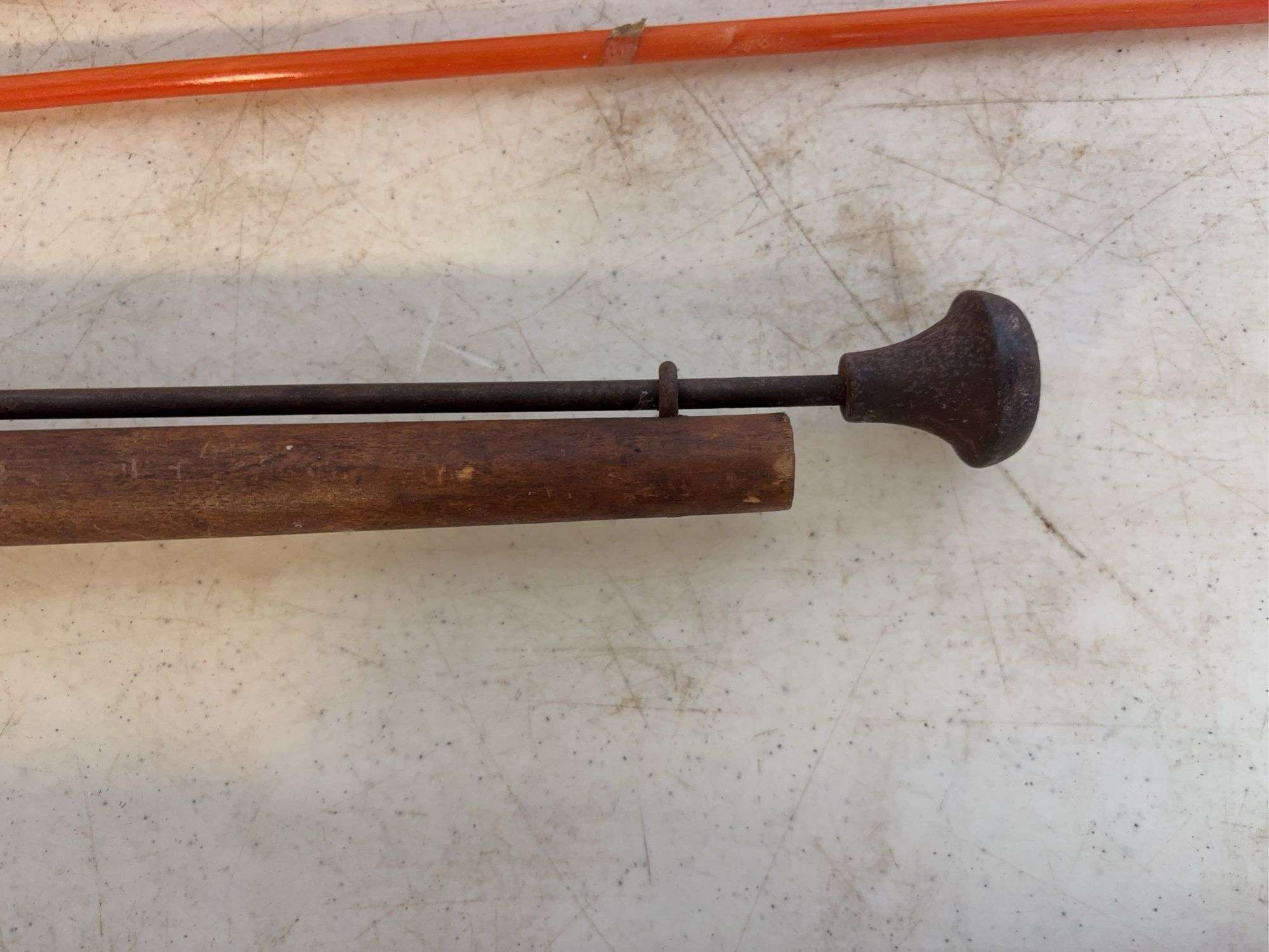 Yard markers, decorative shovel, branch trimmer, and antique piece