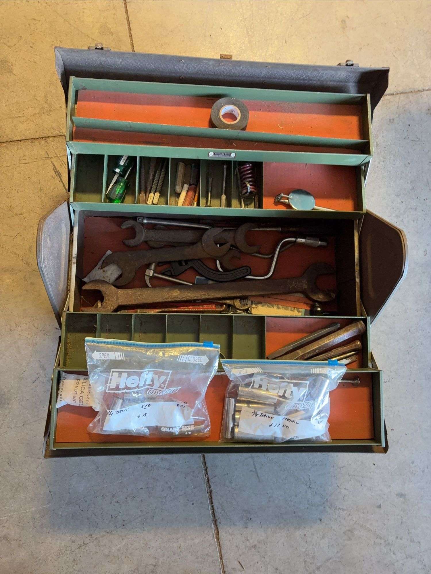 Toolbox with wrenches, hammer, sockets, and more