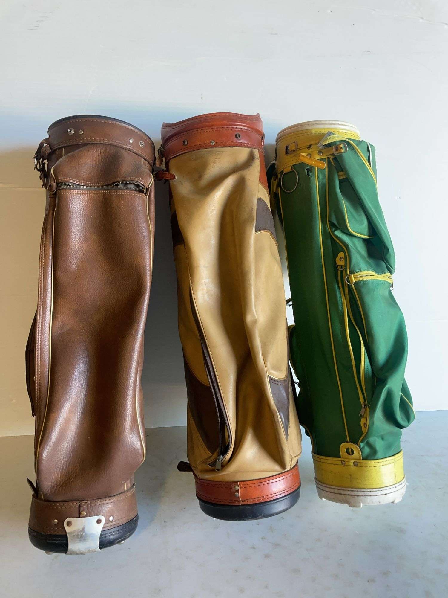 (3) vintage golf bags - Arnold Palmer, Wilson, and St. Andrews