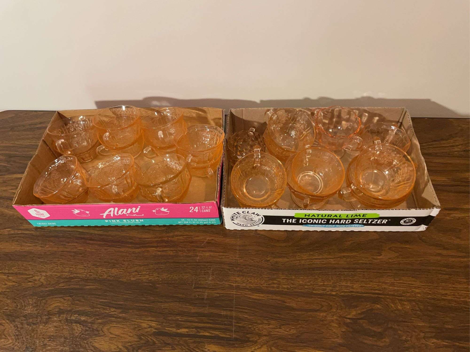 Pink depression glass mugs and sugar/cream containers