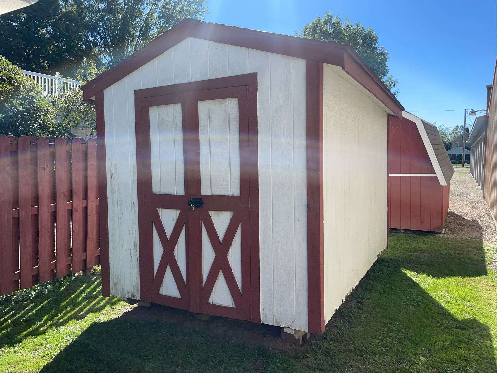 8x12 White and red storage barn - contents not included