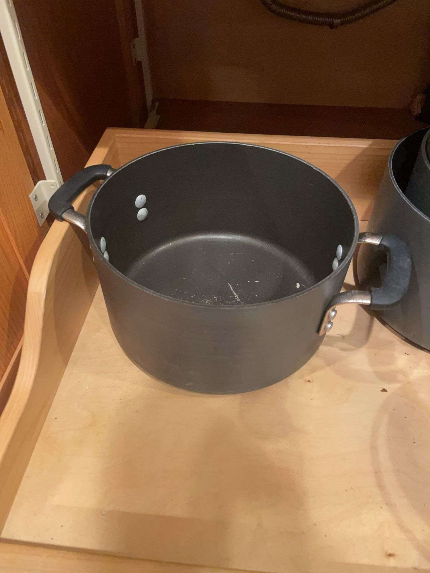 Kitchen drawer w/ mostly pots & lids