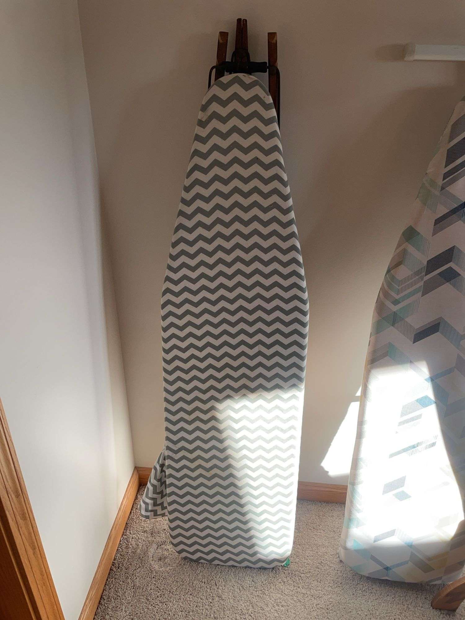 (2) ironing boards and coat tree