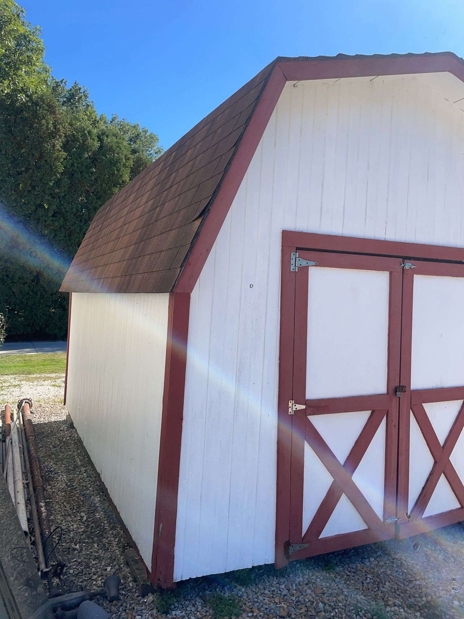 10x14 White and red storage barn - contents not included