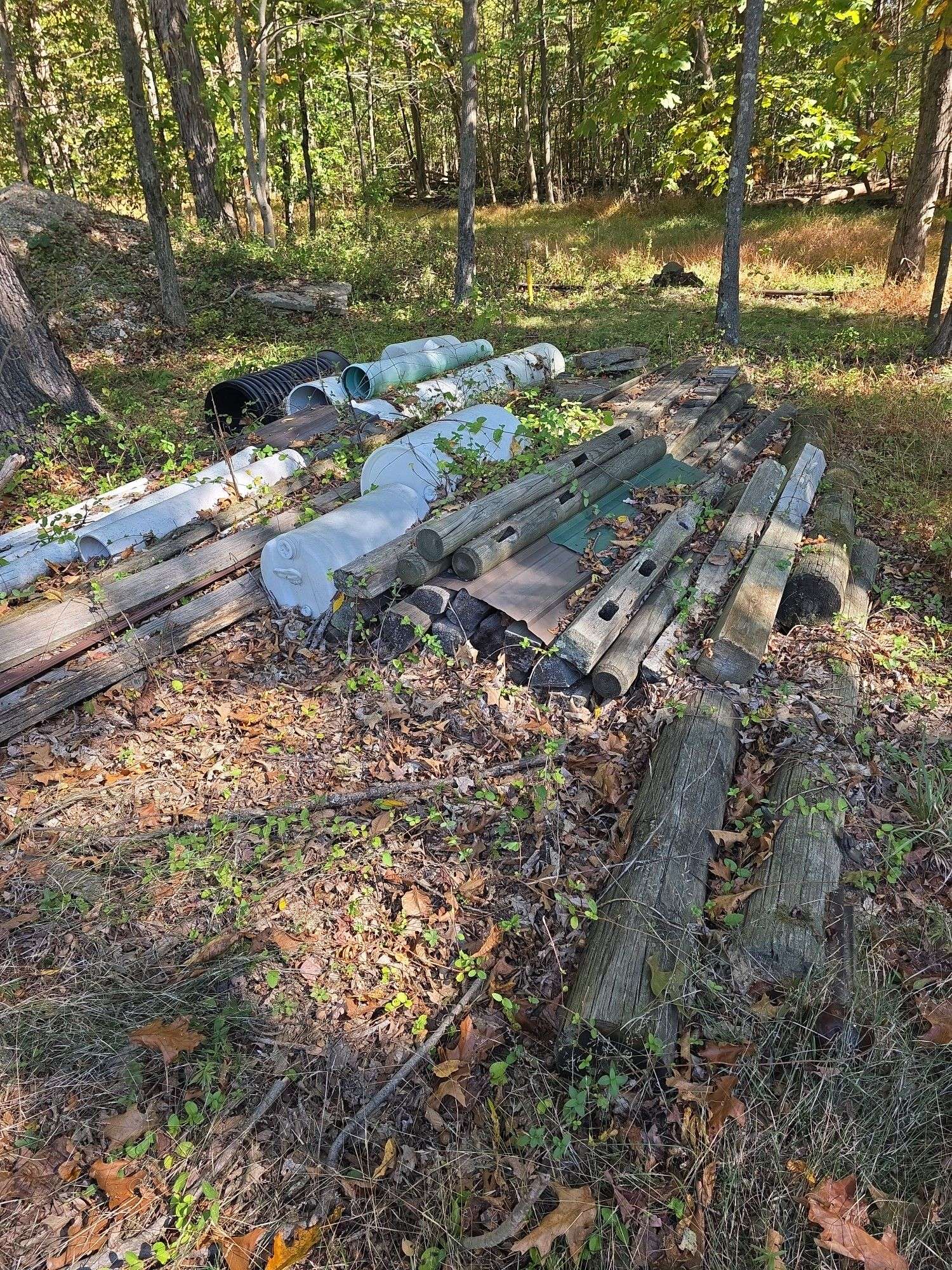 Split rail fence pieces, posts ,pipe & short culvert