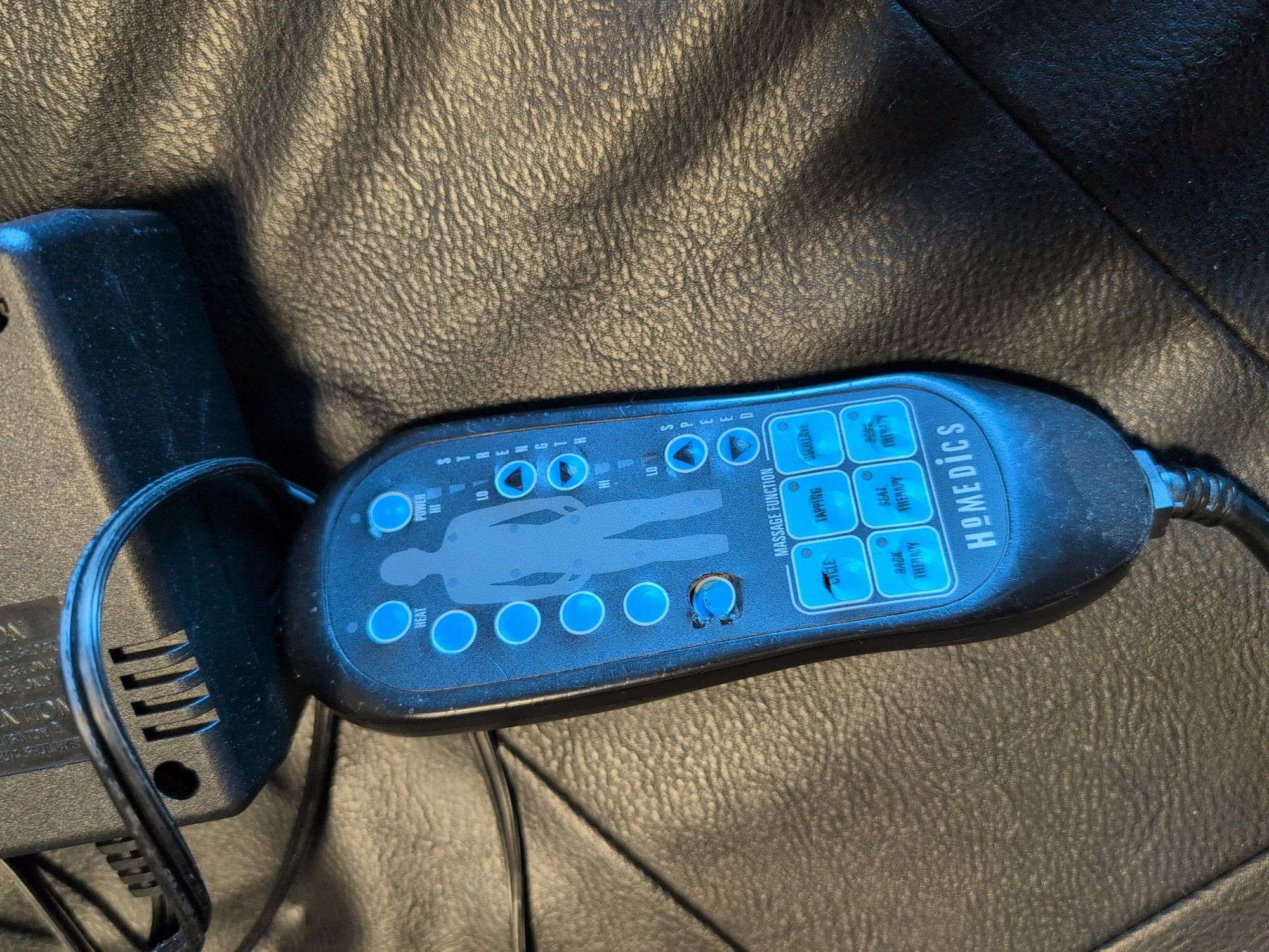 Homedics leather massage chair - some rips