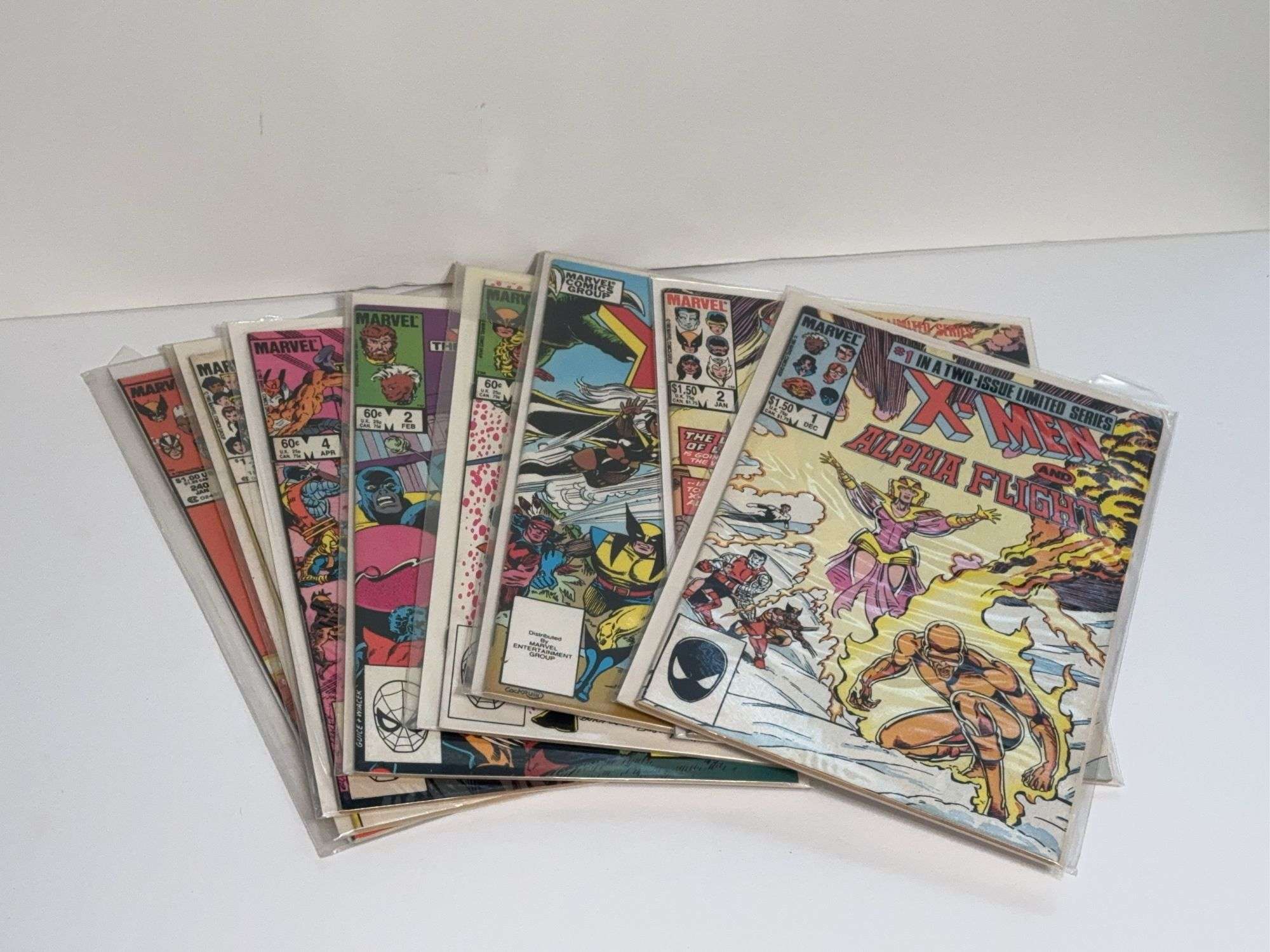 (8) X-Men Comic Books