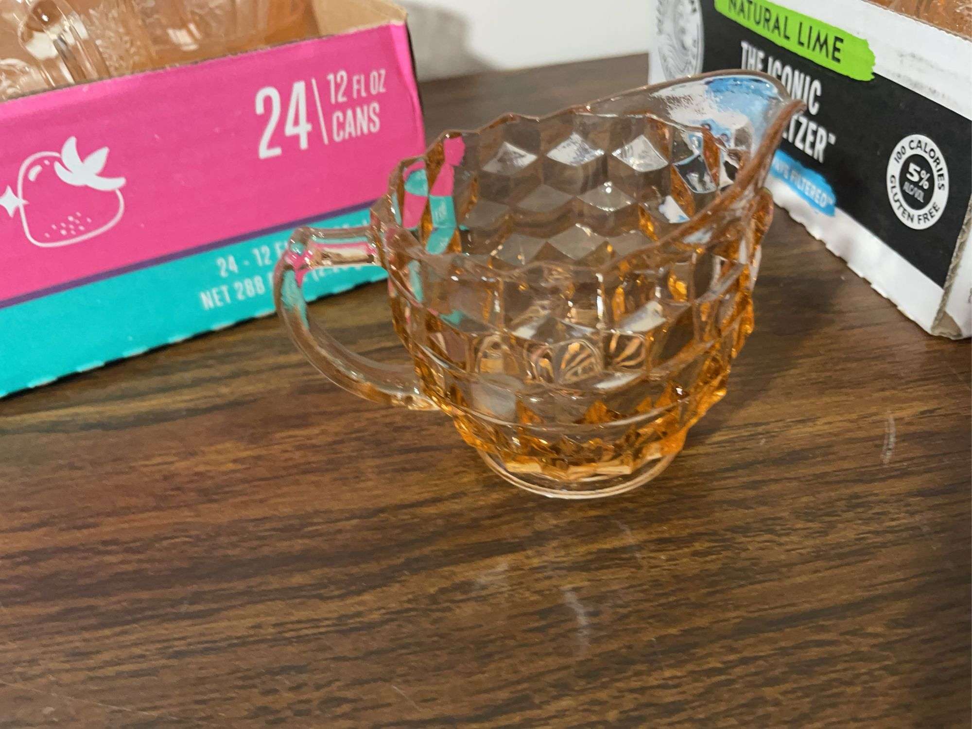 Pink depression glass mugs and sugar/cream containers