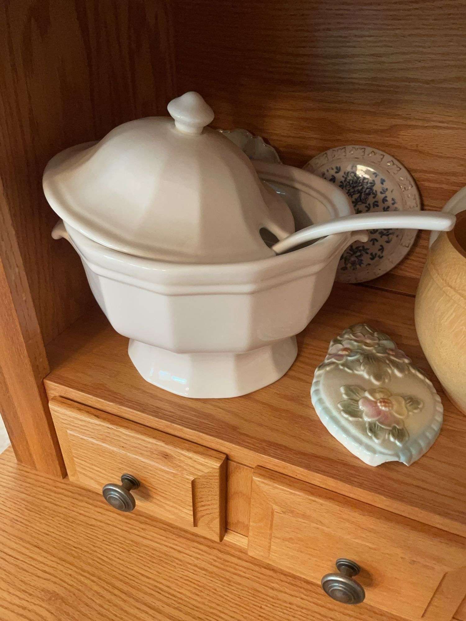 Shelf of glassware - plates, bowls, and more