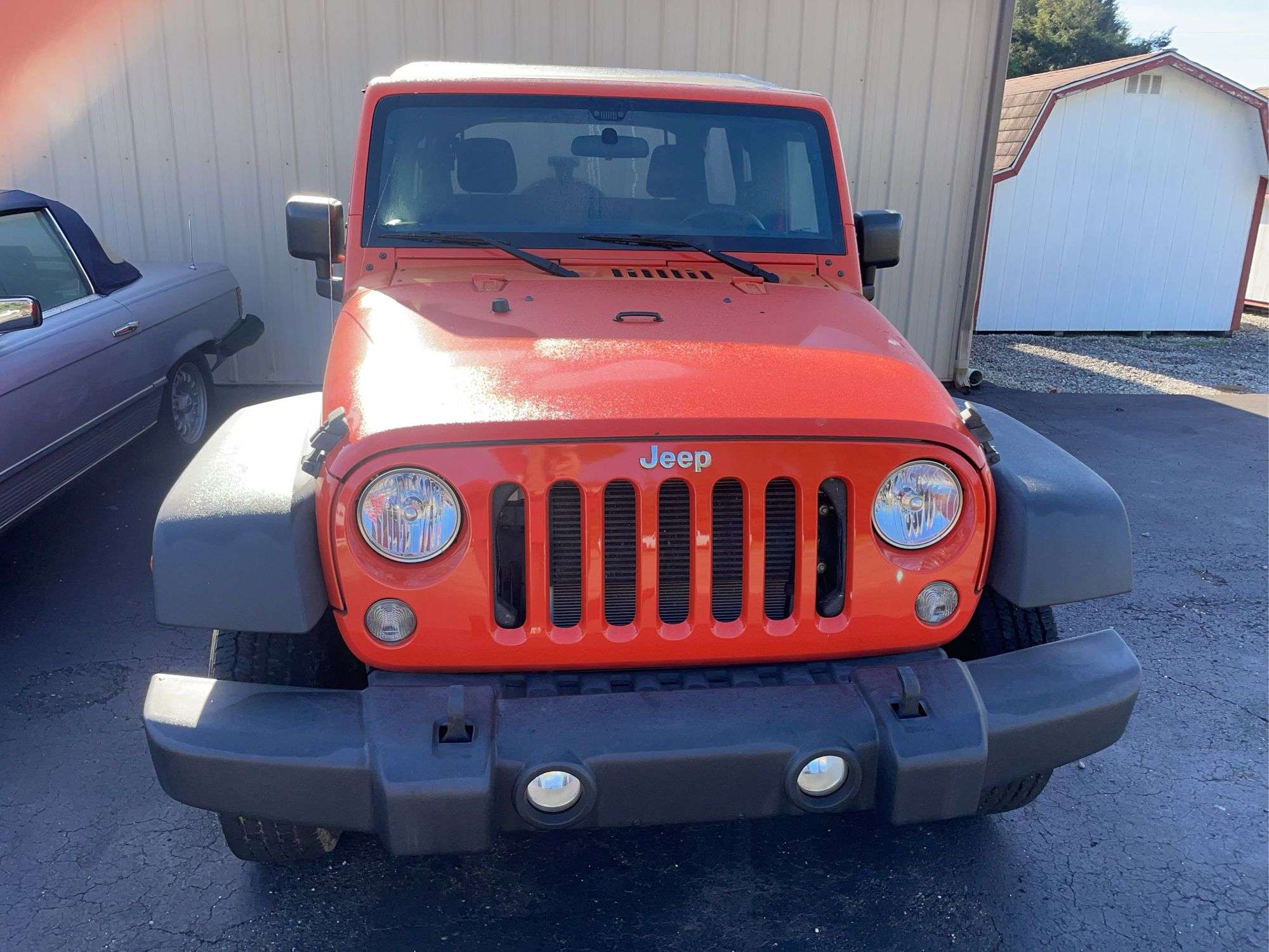 2015 Orange 4D Jeep Wrangler