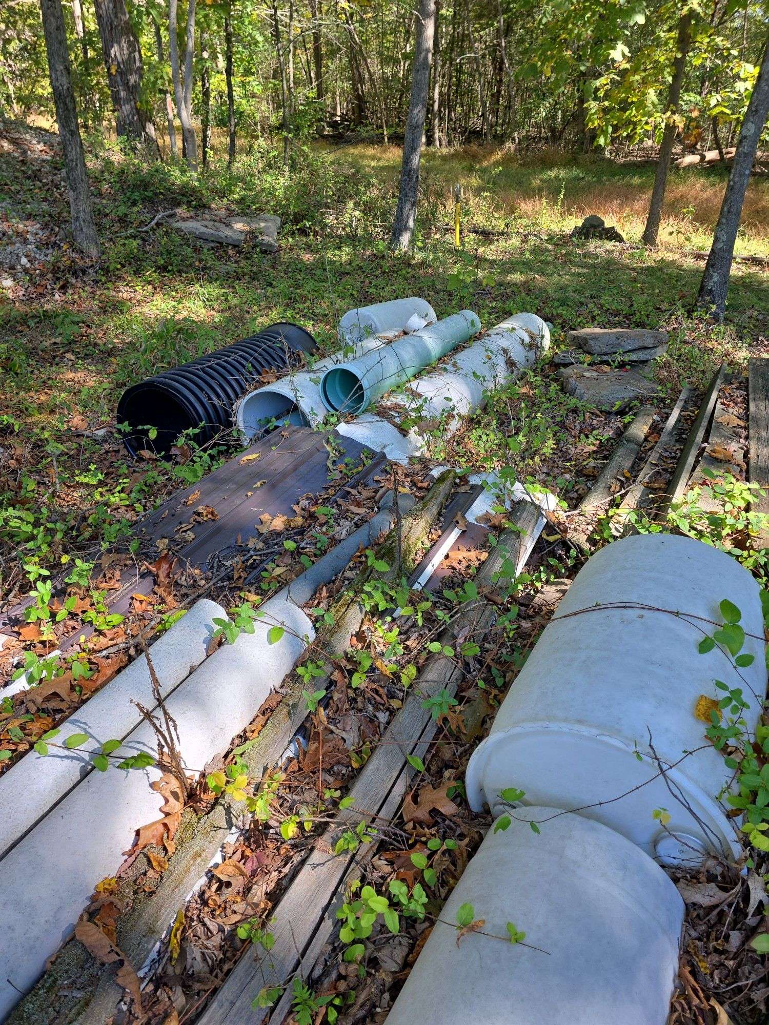 Split rail fence pieces, posts ,pipe & short culvert
