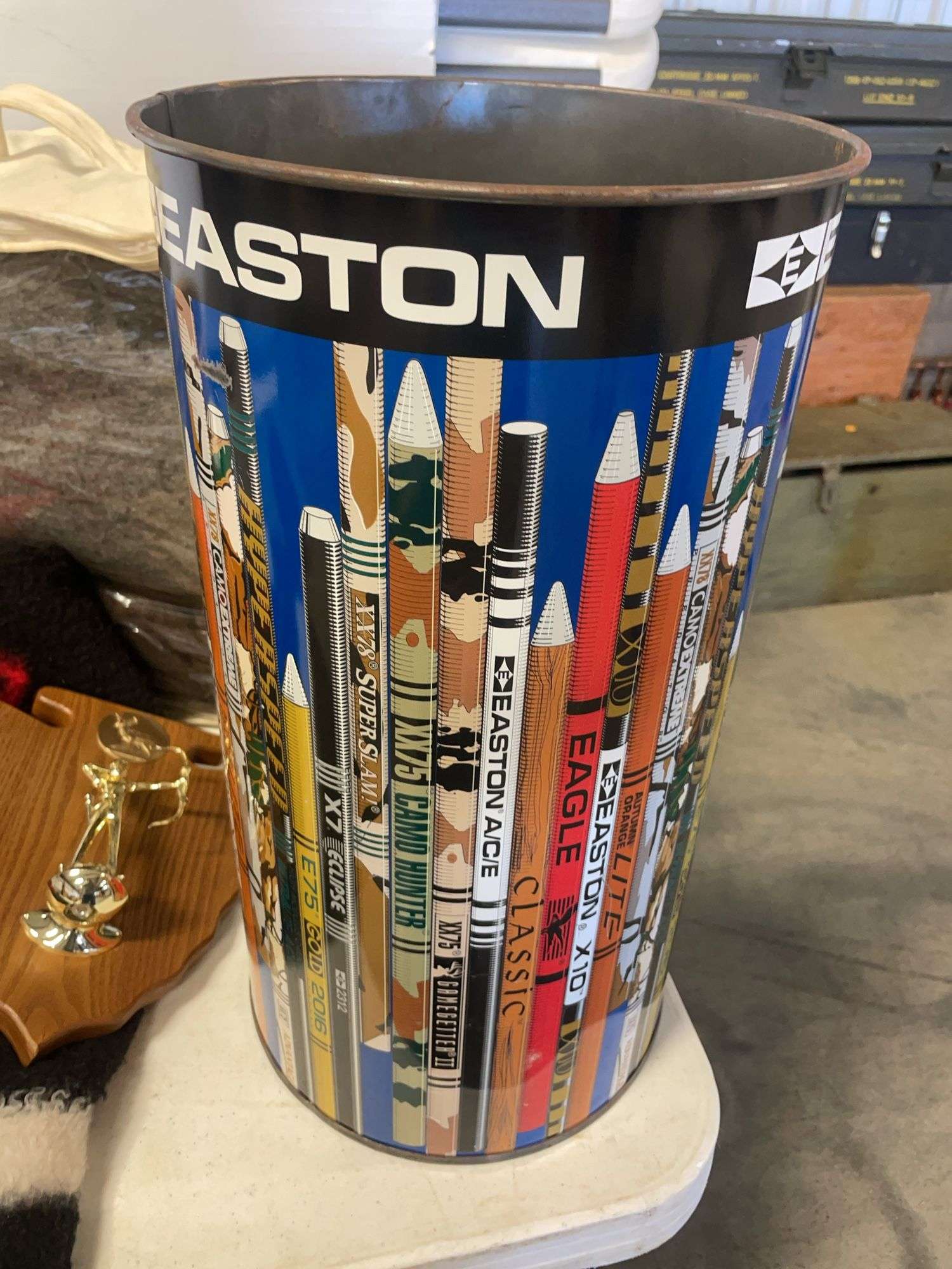 Blankets, seat cushions, Easton trash bin, and basket