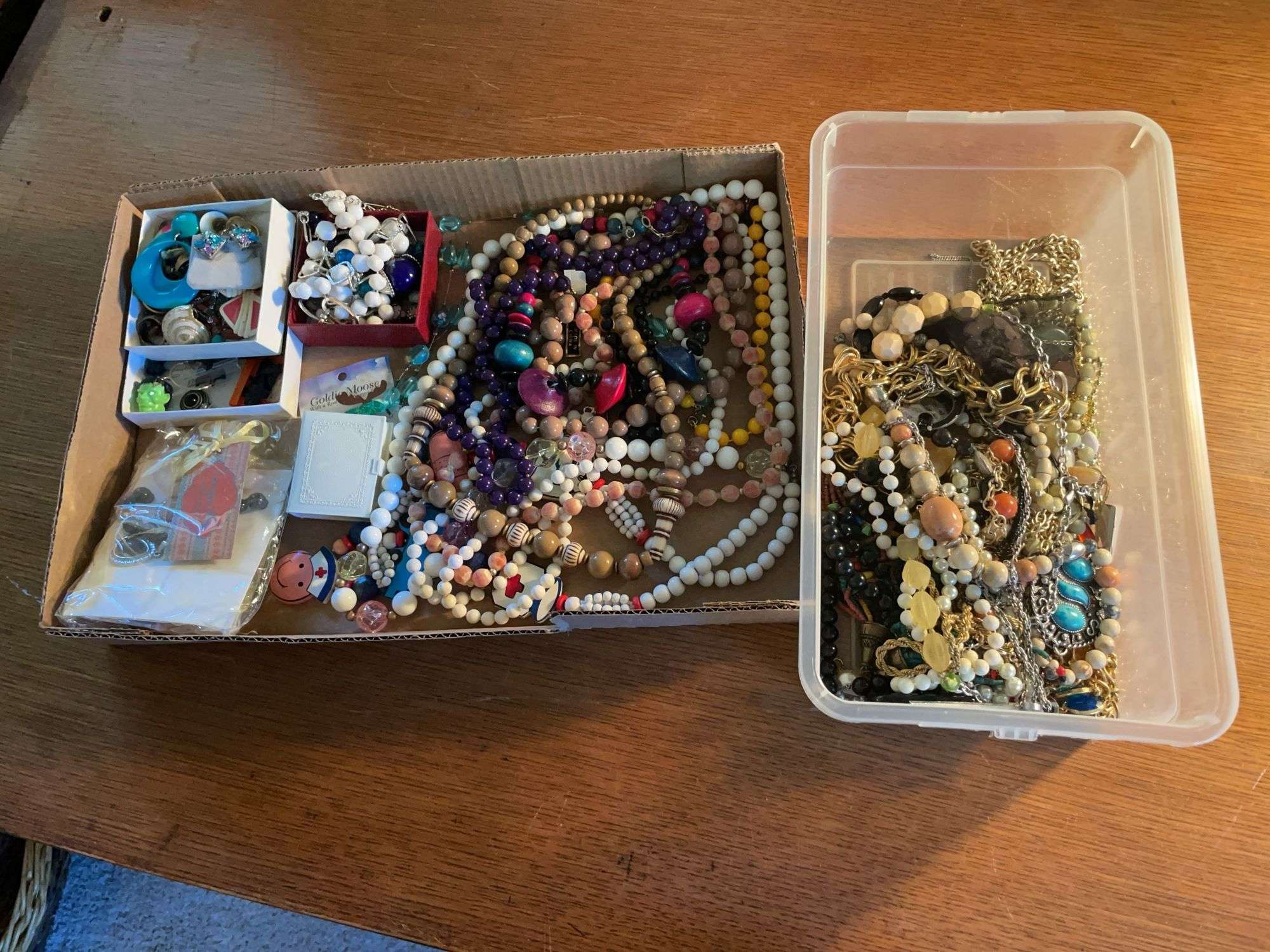 Flat of costume jewelry - mostly necklaces