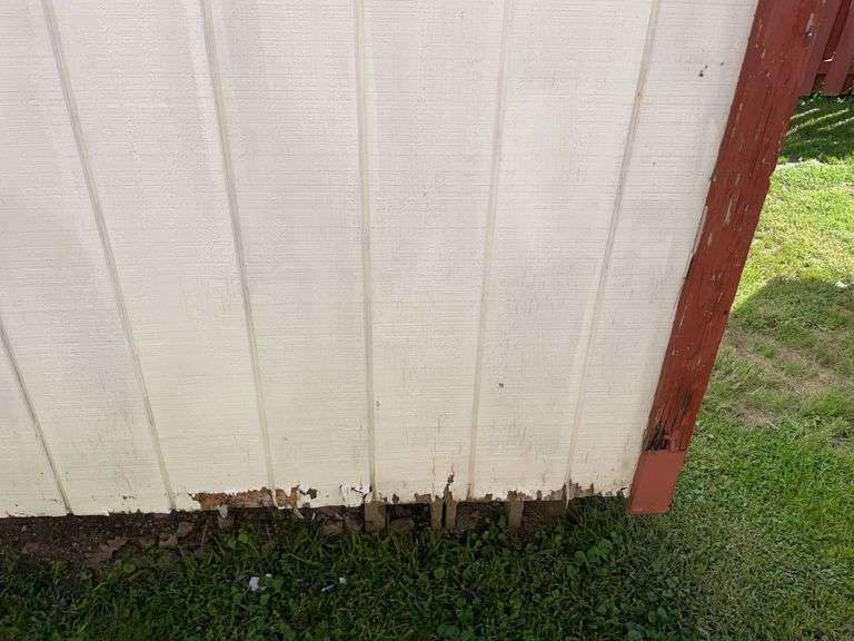 8x12 White and red storage barn - contents not included