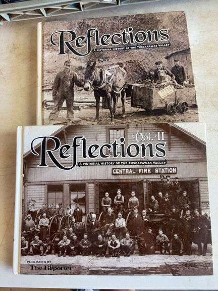 Large assortment of Clive Cussler books and other books