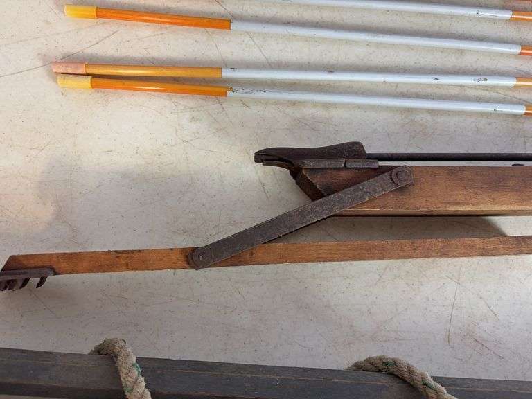 Yard markers, decorative shovel, branch trimmer, and antique piece