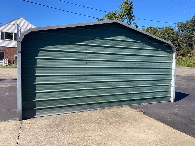 20x21 ft. Green metal Garage - w/ man door & garage door