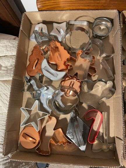 (2) flats of antique cookie cutters and icing dispensers