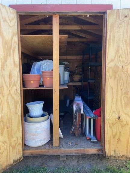 8x12 White and red storage barn - contents not included