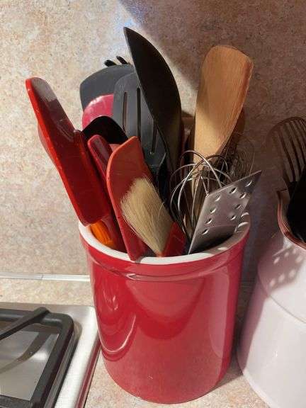 Cutting board and crock with miscellaneous kitchen utensils
