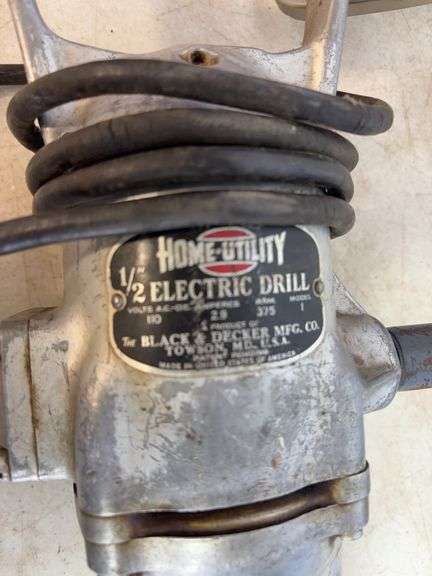 Small propane heater, carpenter's squares, and drill