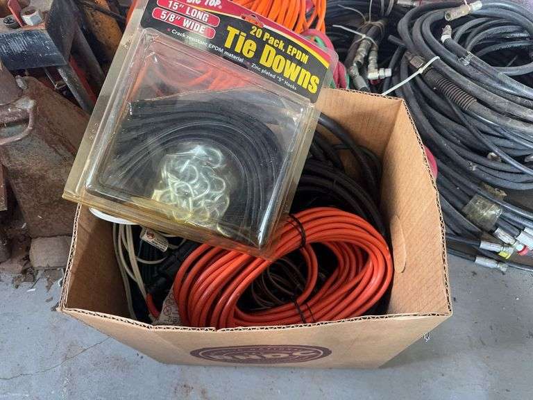 Box of Tie Downs and Extension Cords