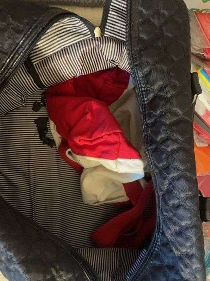 Large assortment of purses, tablecloths, and storage bags