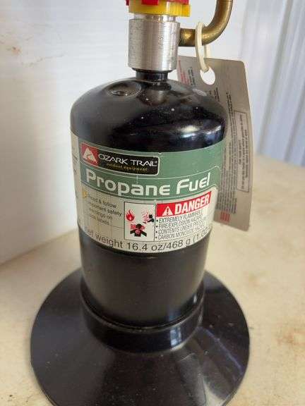 Small propane heater, carpenter's squares, and drill