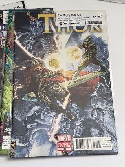 (7) Marvel The Might Captain Marvel and (5) The Might Thor Comics