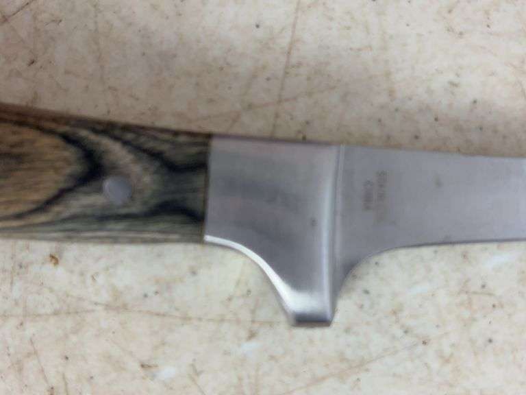 (2) machettes, Cabela's knife, and stainless mesh