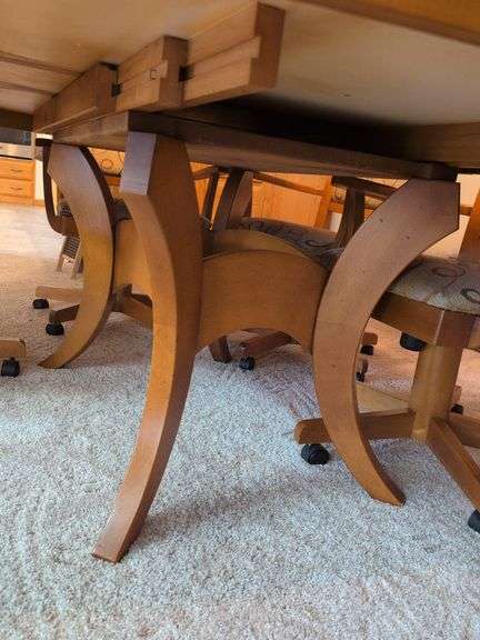 Matching dining table and (6) swivel chairs