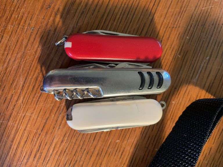 (2) Ambico cameras, blood pressure cuff, and (4) pocket knives