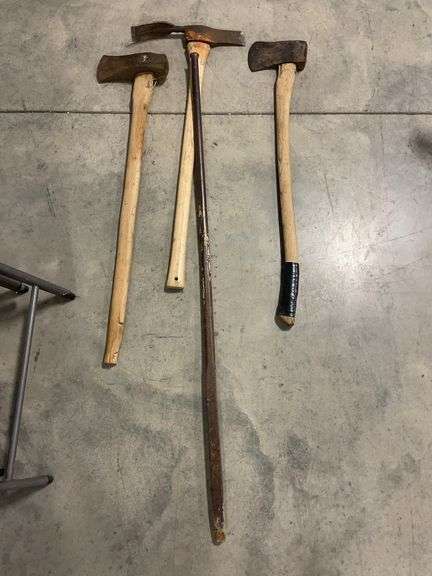 (2) axes, pickaxe, and pry bar