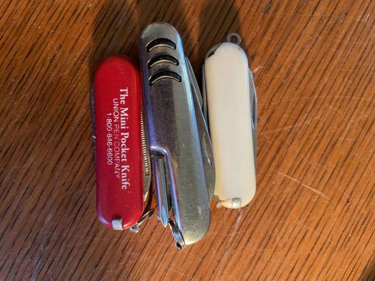 (2) Ambico cameras, blood pressure cuff, and (4) pocket knives