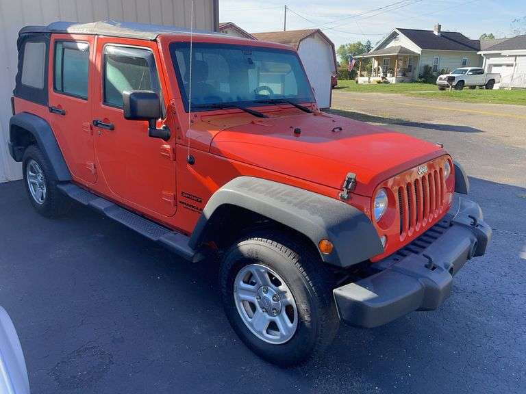 2015 Orange 4D Jeep Wrangler