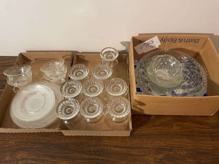 Assortment of clear glassware - cups, dishes, bowls, and more