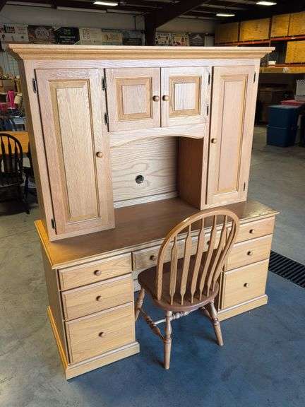 Office desk with cabinets and chair