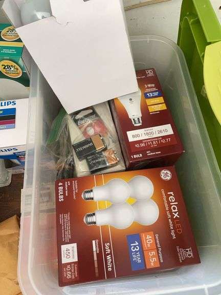 Contents of shelving including lightbulbs, screw-in hooks & more